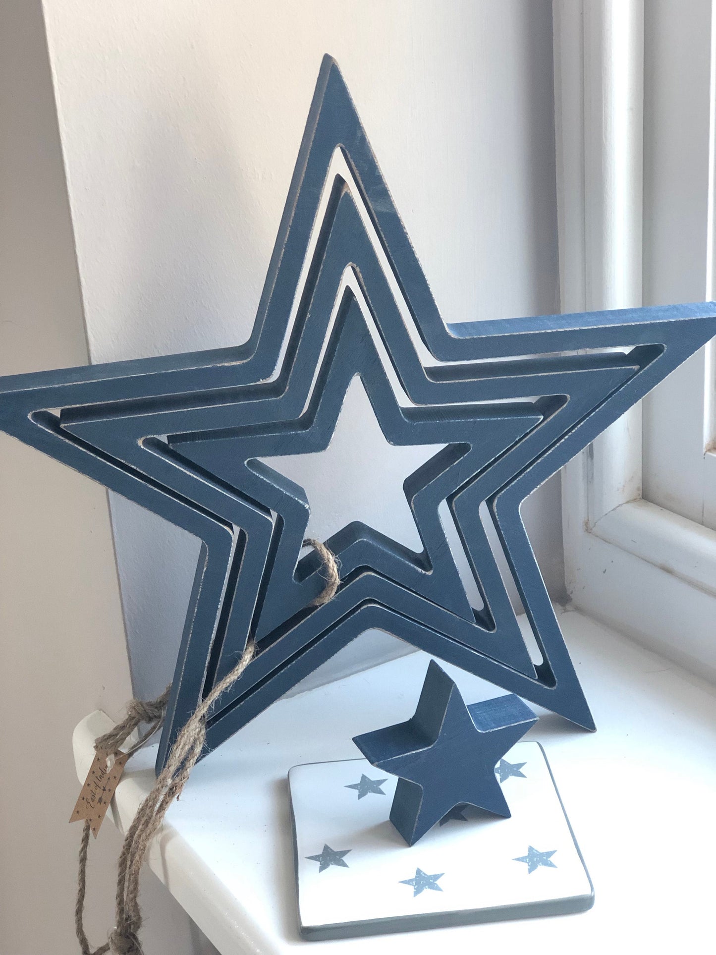 Set of 4 Blue Wooden Stars.