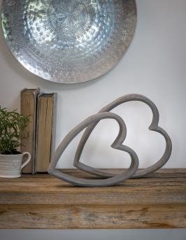 Wooden sleeping hearts, in distressed grey wood