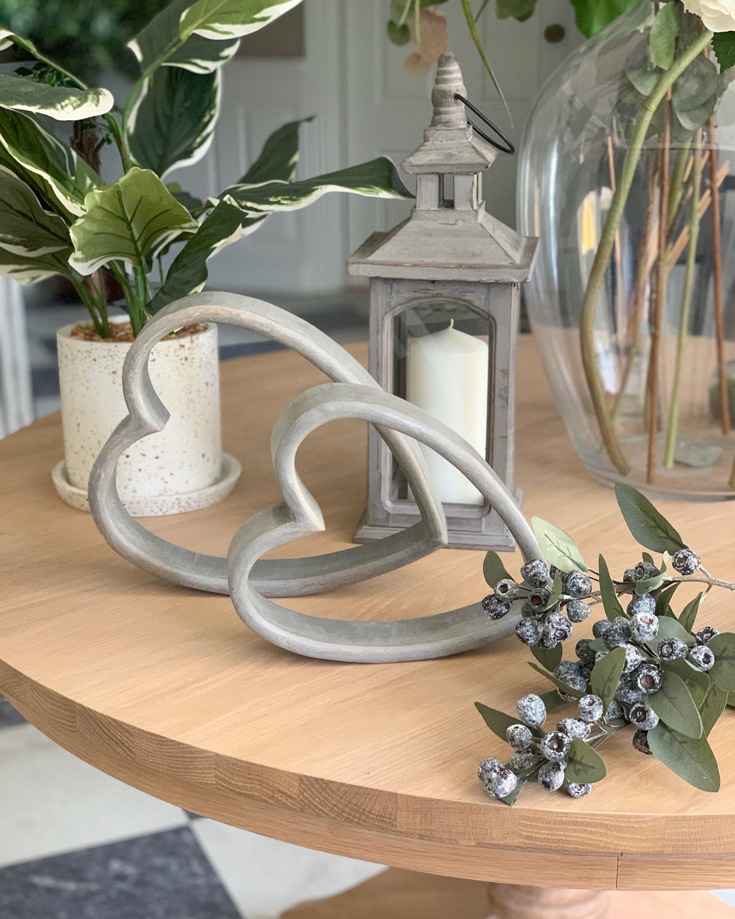 Wooden sleeping hearts, in distressed grey wood