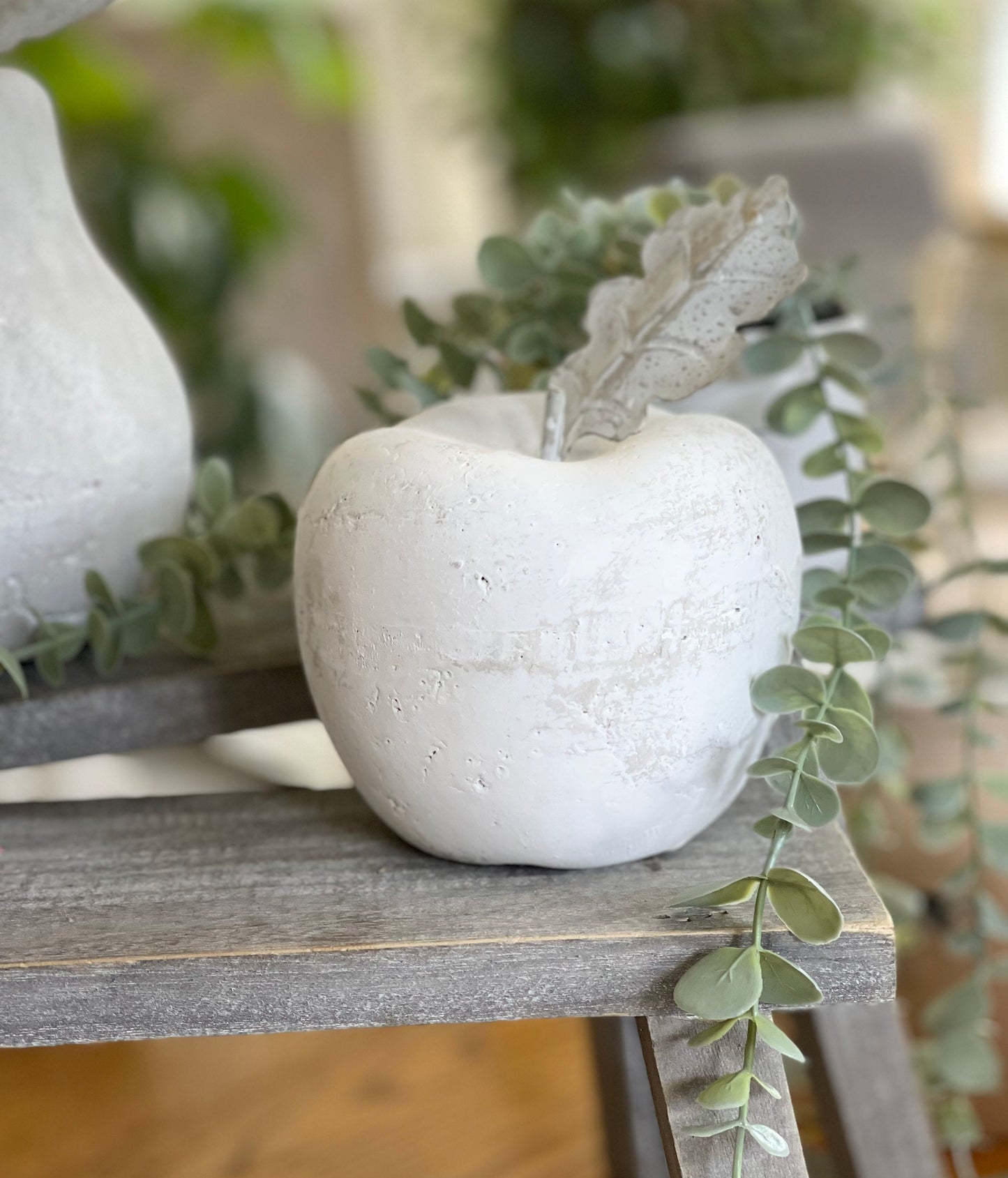 Stone Pear sculpture with antiqued finish