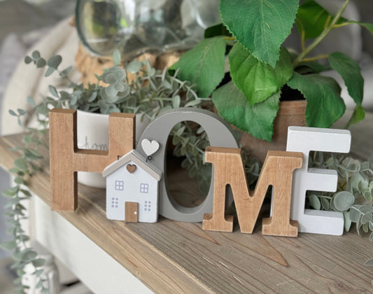 Freestanding classic wooden "HOME" sign.