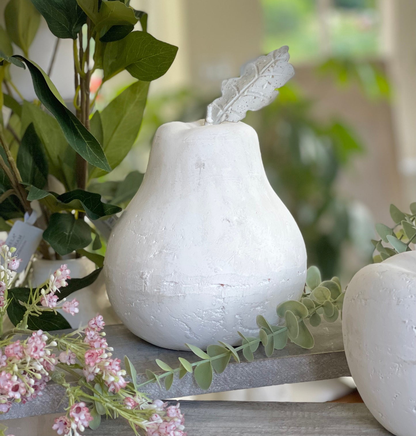 Stone Pear sculpture with antiqued finish