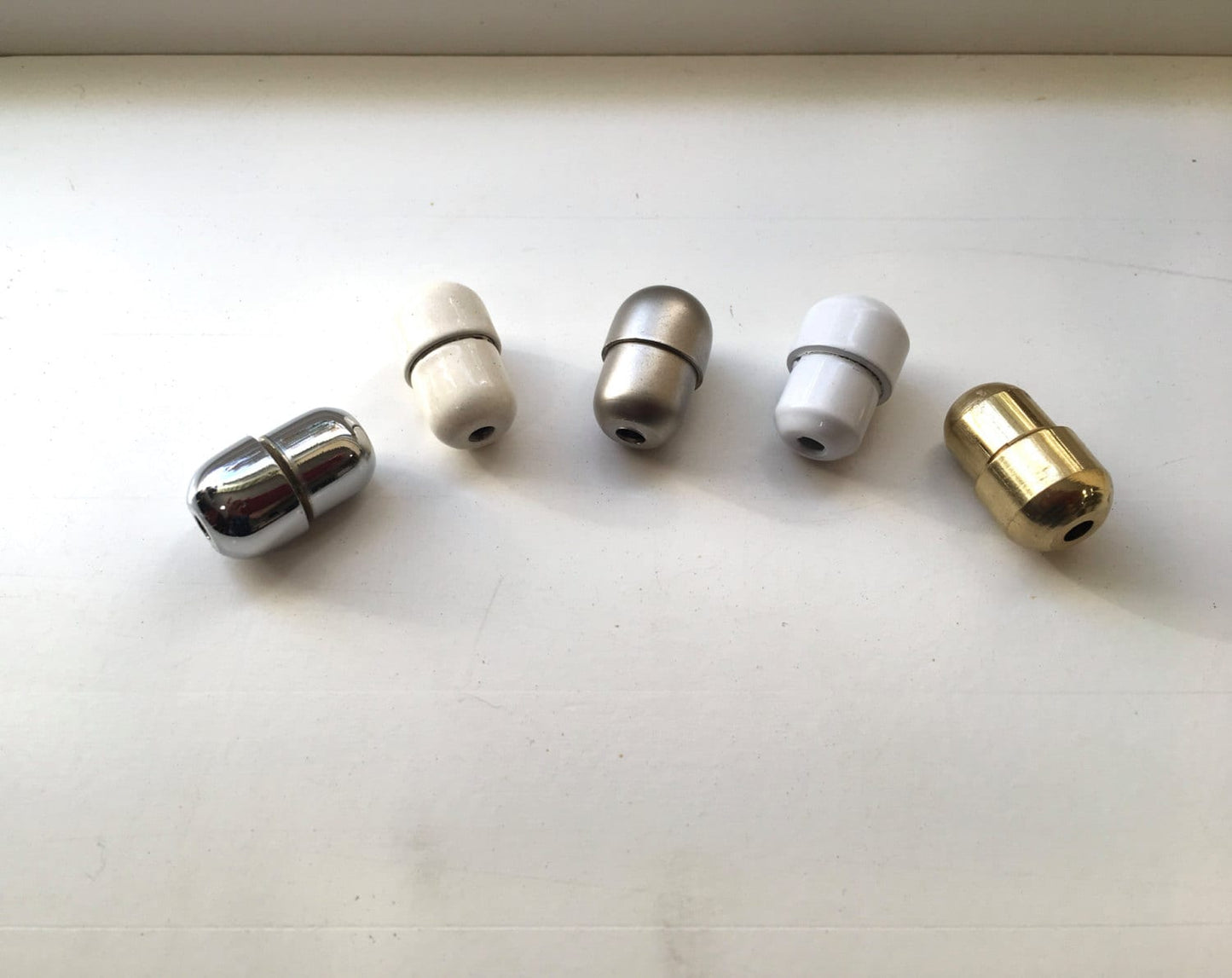 Metal Cord Connector. Ideal for connecting several blind blind cords.  Available in 6 colour.